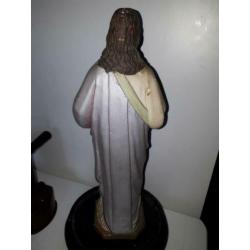 Beeld Jezus onder stolp