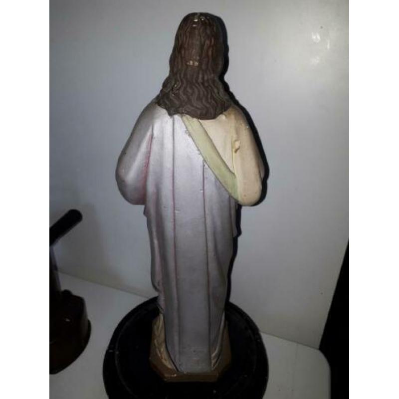 Beeld Jezus onder stolp