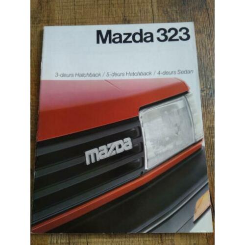 Mazda 323 folder uit 1985