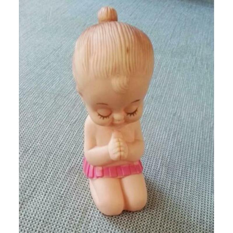 Popje van rubber Meisje in gebed