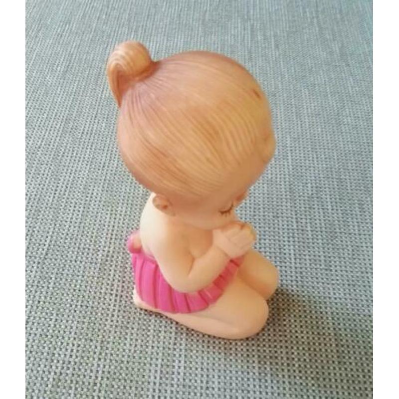 Popje van rubber Meisje in gebed