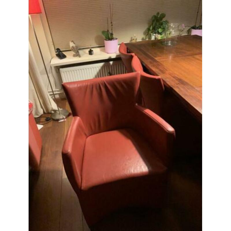 6 lederen stoelen + tafel