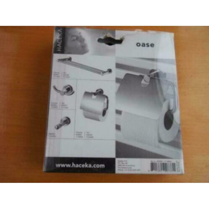 064 Haceka Adoria Oase, closetrolhouder radiatorbevestiging