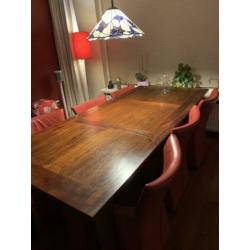 6 lederen stoelen + tafel
