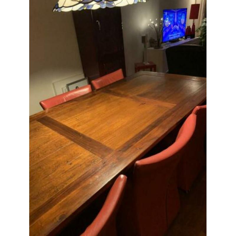 6 lederen stoelen + tafel