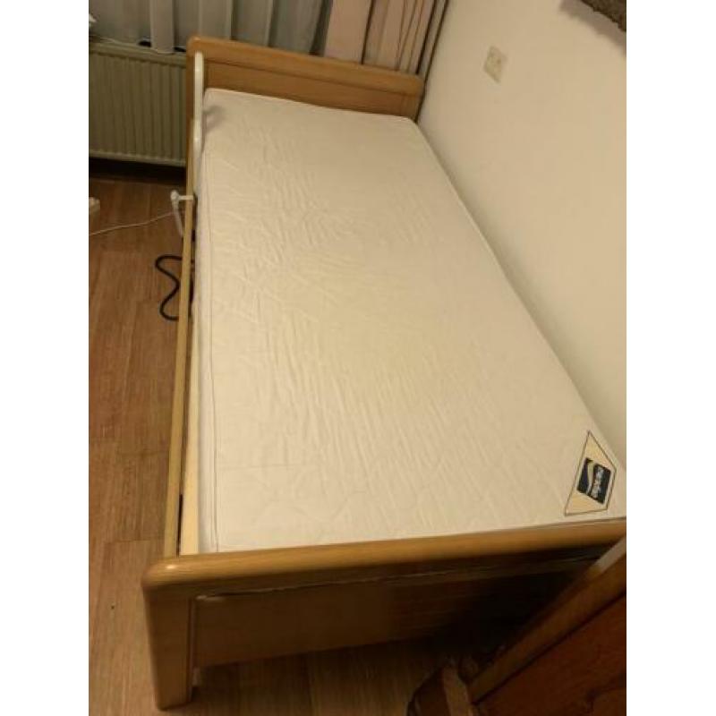 Bed met steun