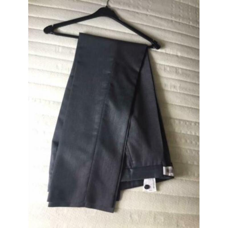 Kostuums van Zara