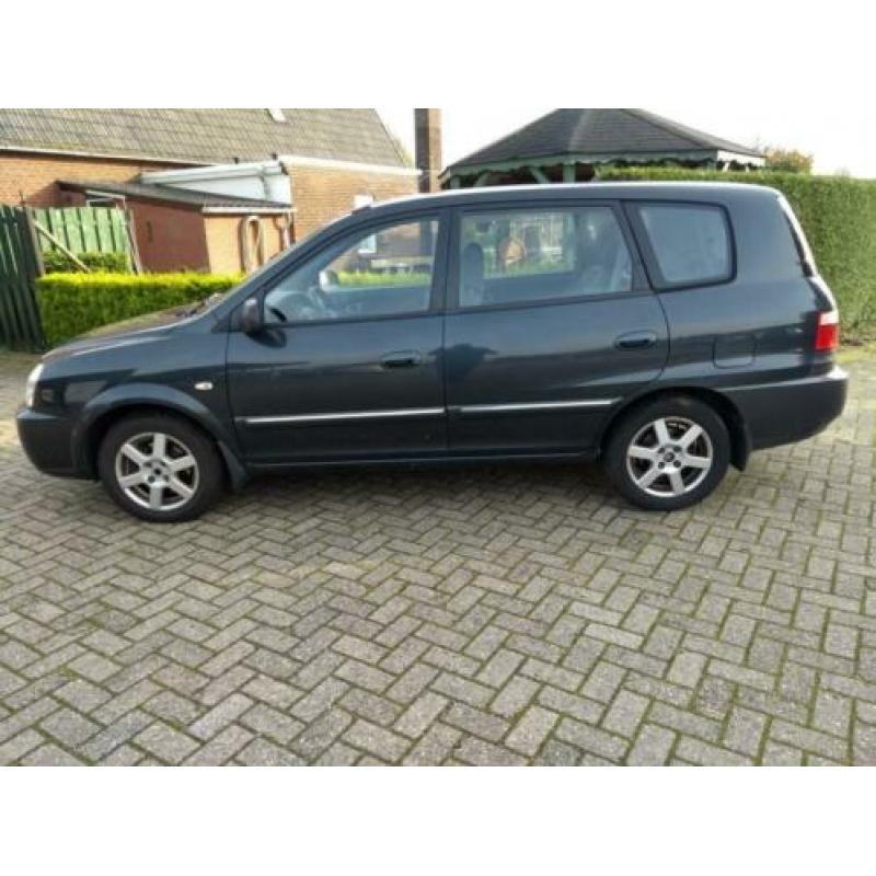 Kia Carens 2.0 CVVT M-bition