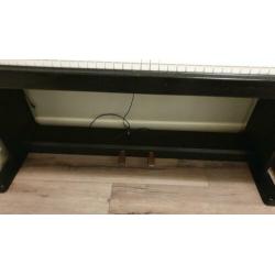 Elektrische Piano Technics met gewogen toetsen.