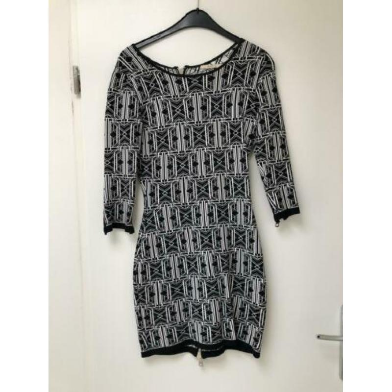 Nikkie kleding maat 34