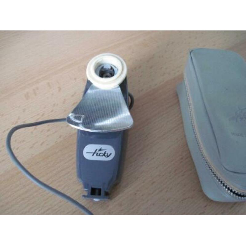 (919) Ticky Lampjesflitser in origineel grijs etui