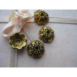 1039/ gold plated tibetiaanse kralenkapjes