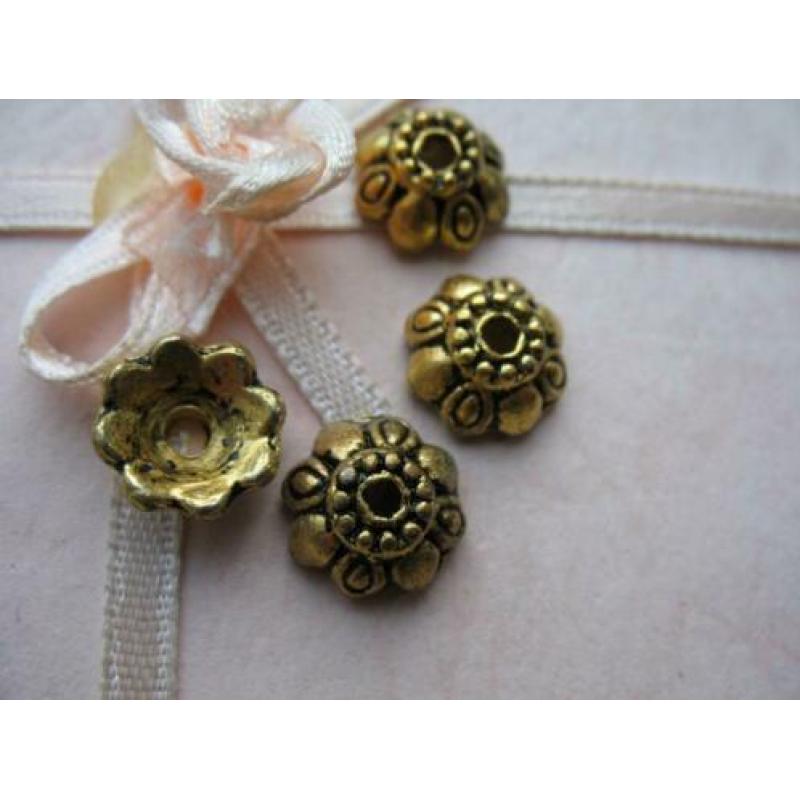 1039/ gold plated tibetiaanse kralenkapjes