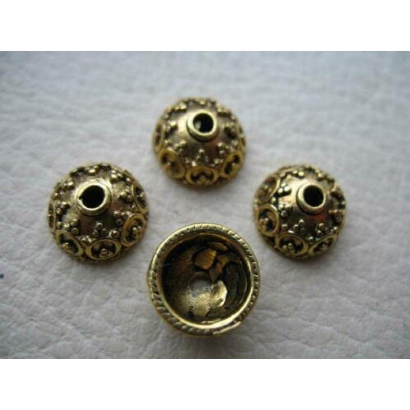 1039/ gold plated tibetiaanse kralenkapjes