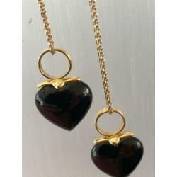 Double oorbellen met onyx hartje
