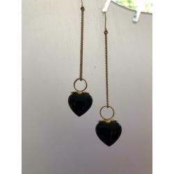 Double oorbellen met onyx hartje