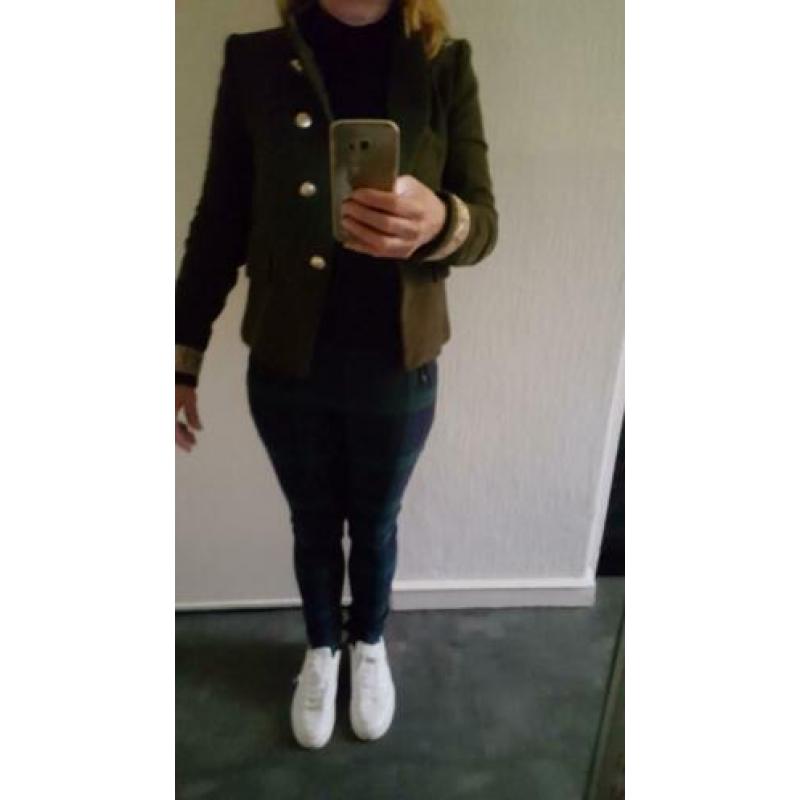 donkergroene velours jasje met goudkleurig