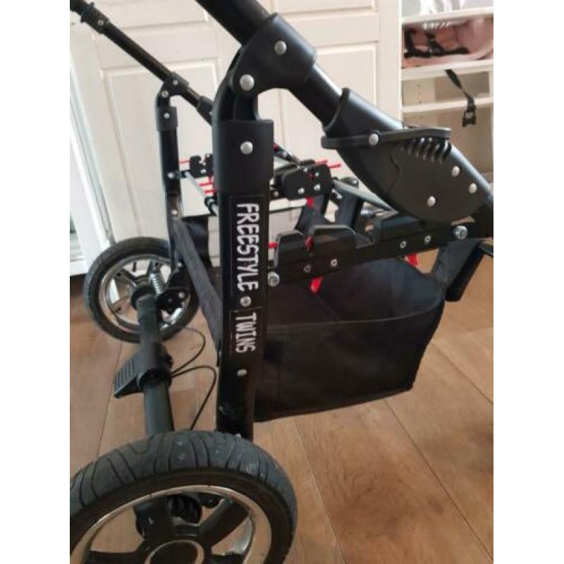 Mooie j/m tweeling kinderwagen