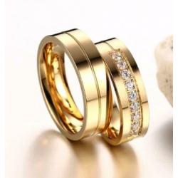 Stalen 6 mm. in goud kleur trouwring met zirkonen