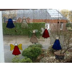 Tiffany raamhanger glas in lood vogel vlinder roos olifant