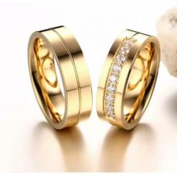 Stalen 6 mm. in goud kleur trouwring met zirkonen