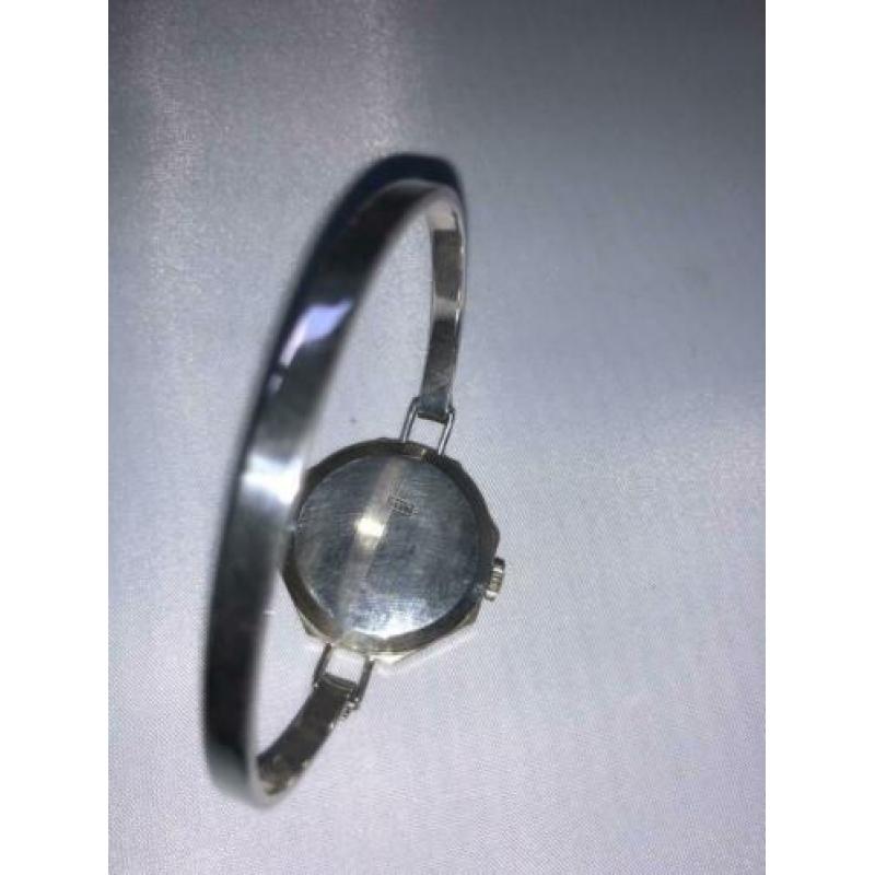 Vintage zilveren dames horloge gemerkt in klok en band
