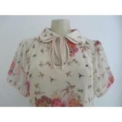 Jurk met bloemen- en vogeldessin van Collectif (UK)
