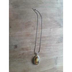 Zilver ketting met hanger.