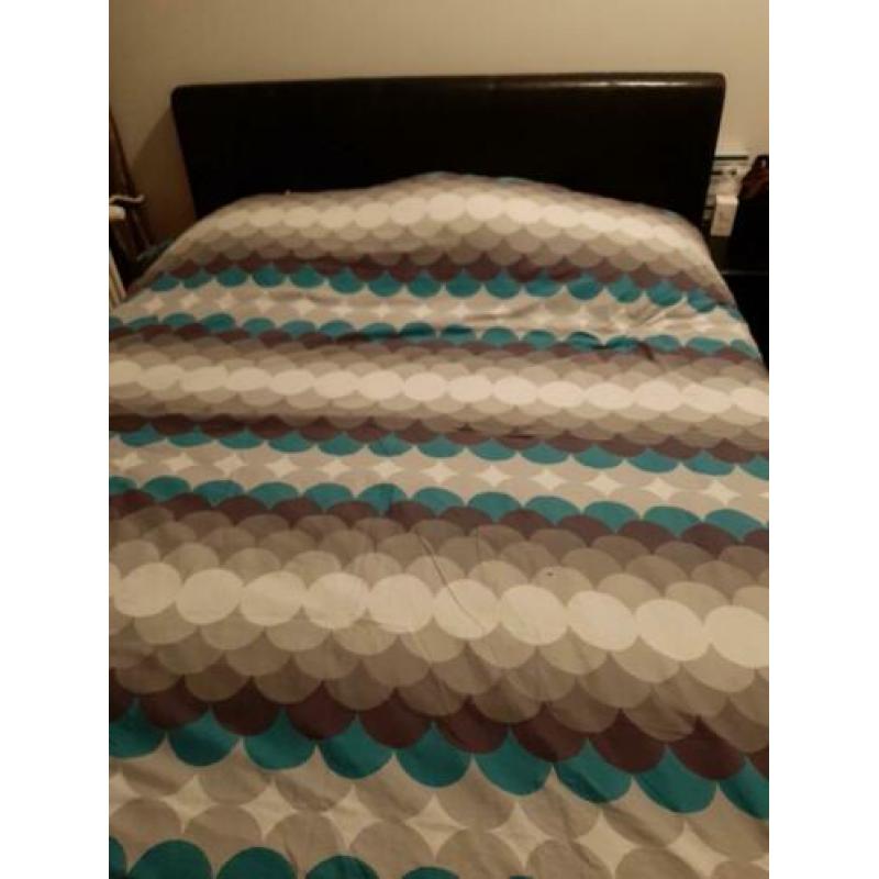 Bed met opbergruimte