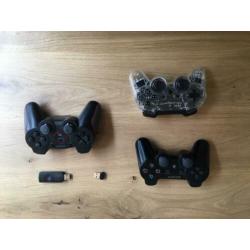 PS3 met 3 controllers en games