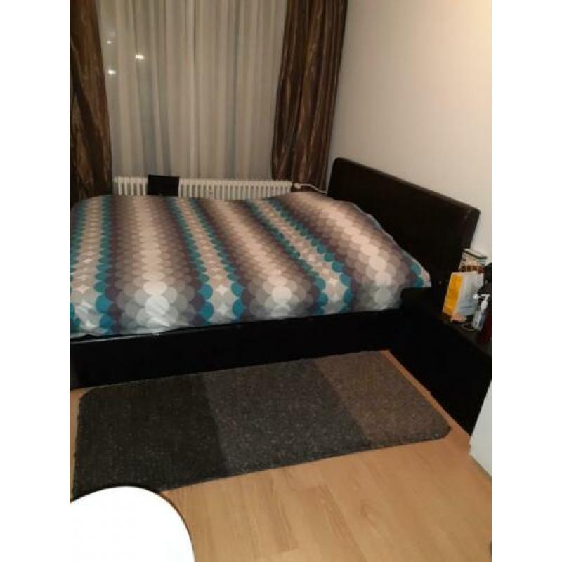 Bed met opbergruimte