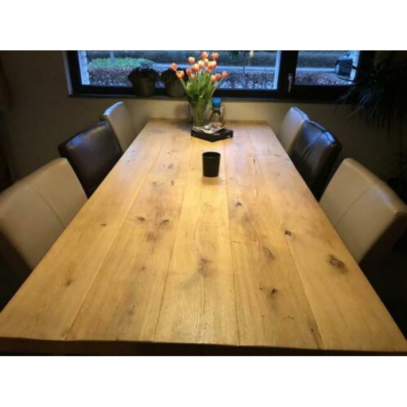 6 eetkamerstoelen leder 4 taupe+2 bruin direct beschikbaar!