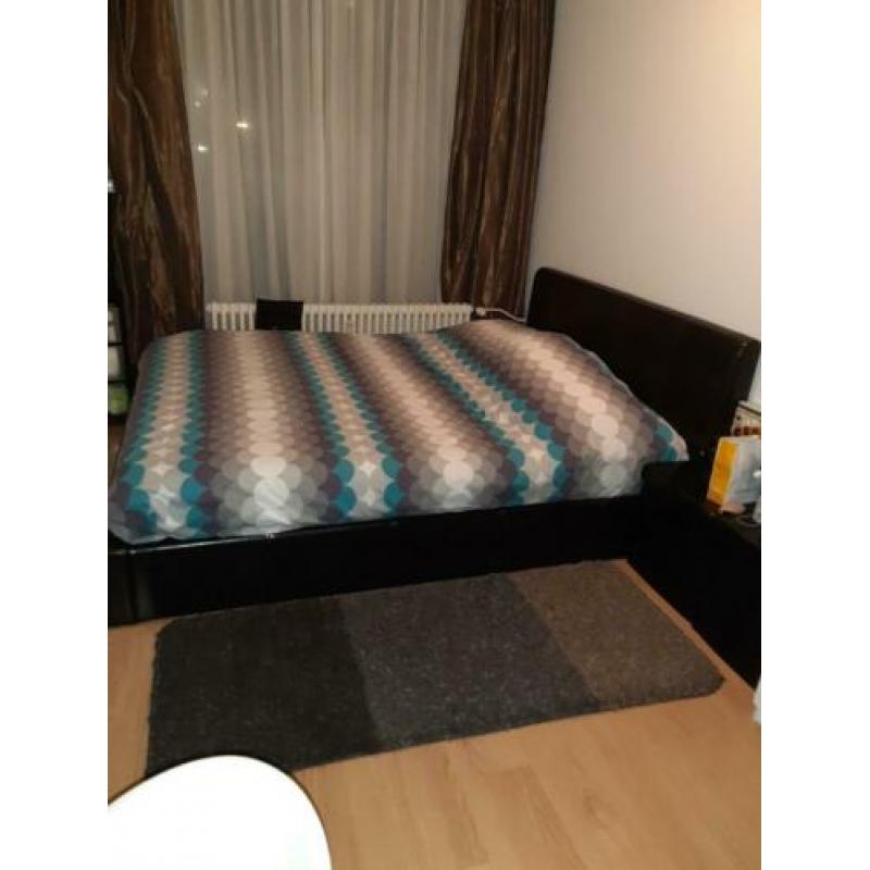 Bed met opbergruimte