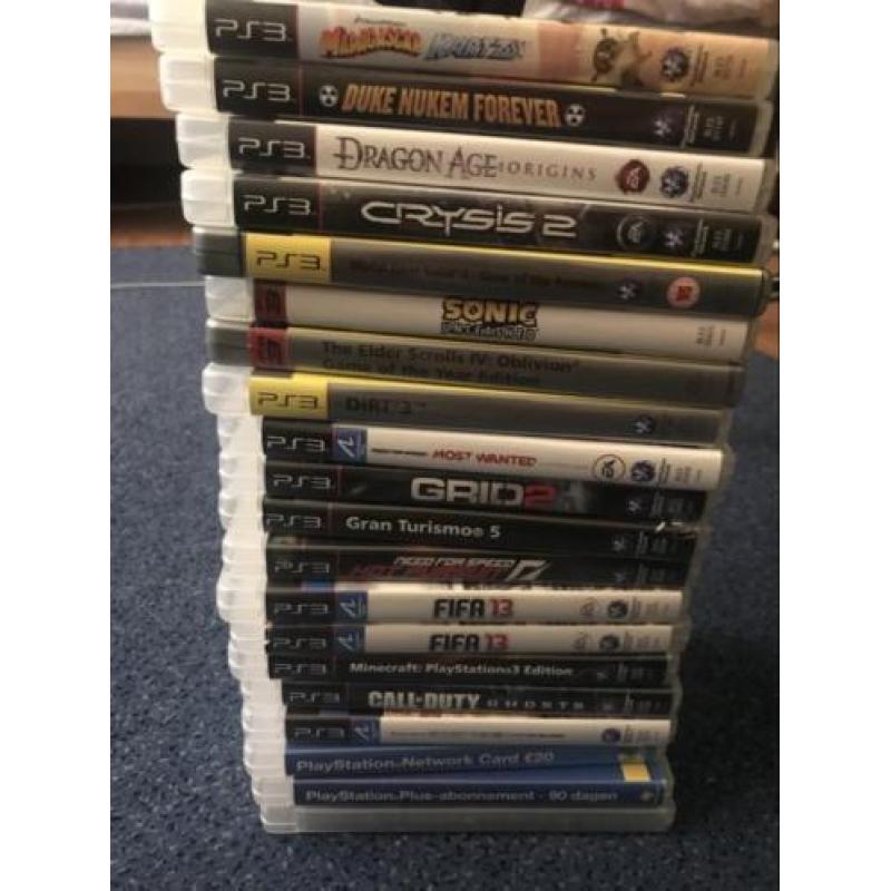 Ps3 slim met twee controllers en 22 Top spellen!