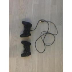 PlayStation 3 met 11 games en 2 controllers