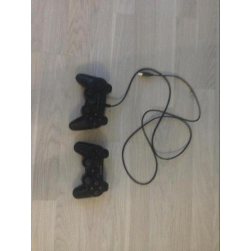 PlayStation 3 met 11 games en 2 controllers