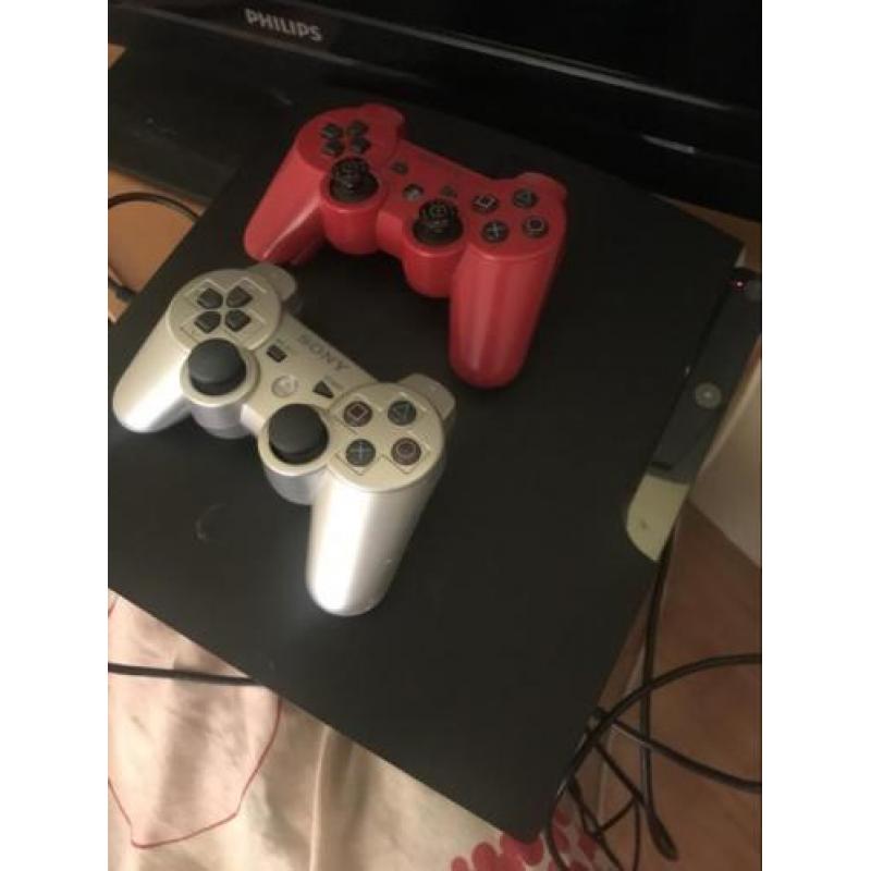 Ps3 slim met twee controllers en 22 Top spellen!