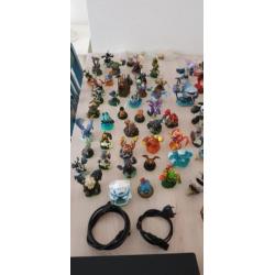 Ps3 slim te koop inclusief 11 spellen en skylander poppen