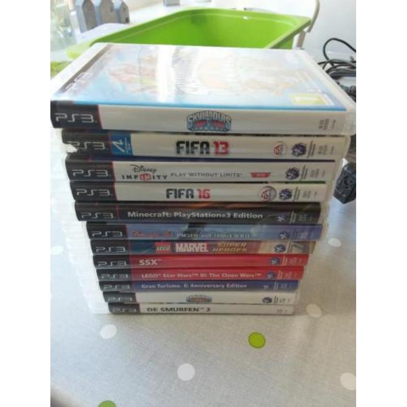 Playstation 3 (500Gb), 2 controllers, 12 spellen, etc