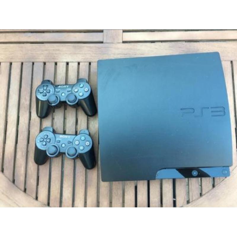 Playstation 3 slim met 2 controllers en 6 spellen