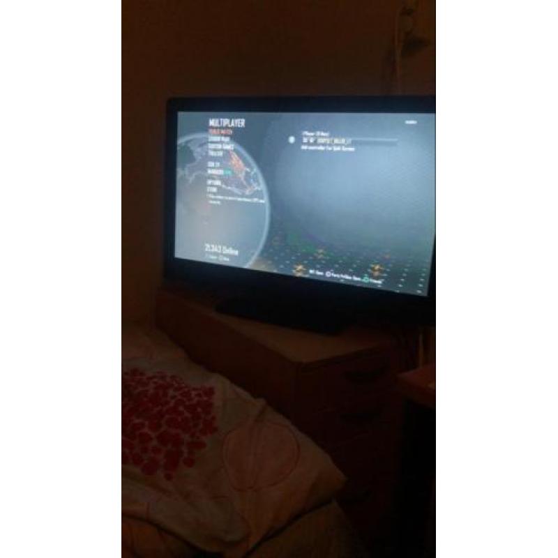 Ps3 slim met twee controllers en 22 Top spellen!
