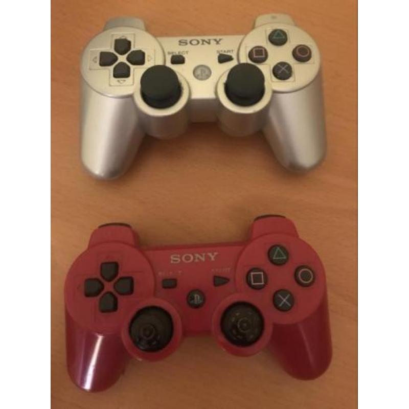 Ps3 slim met twee controllers en 22 Top spellen!